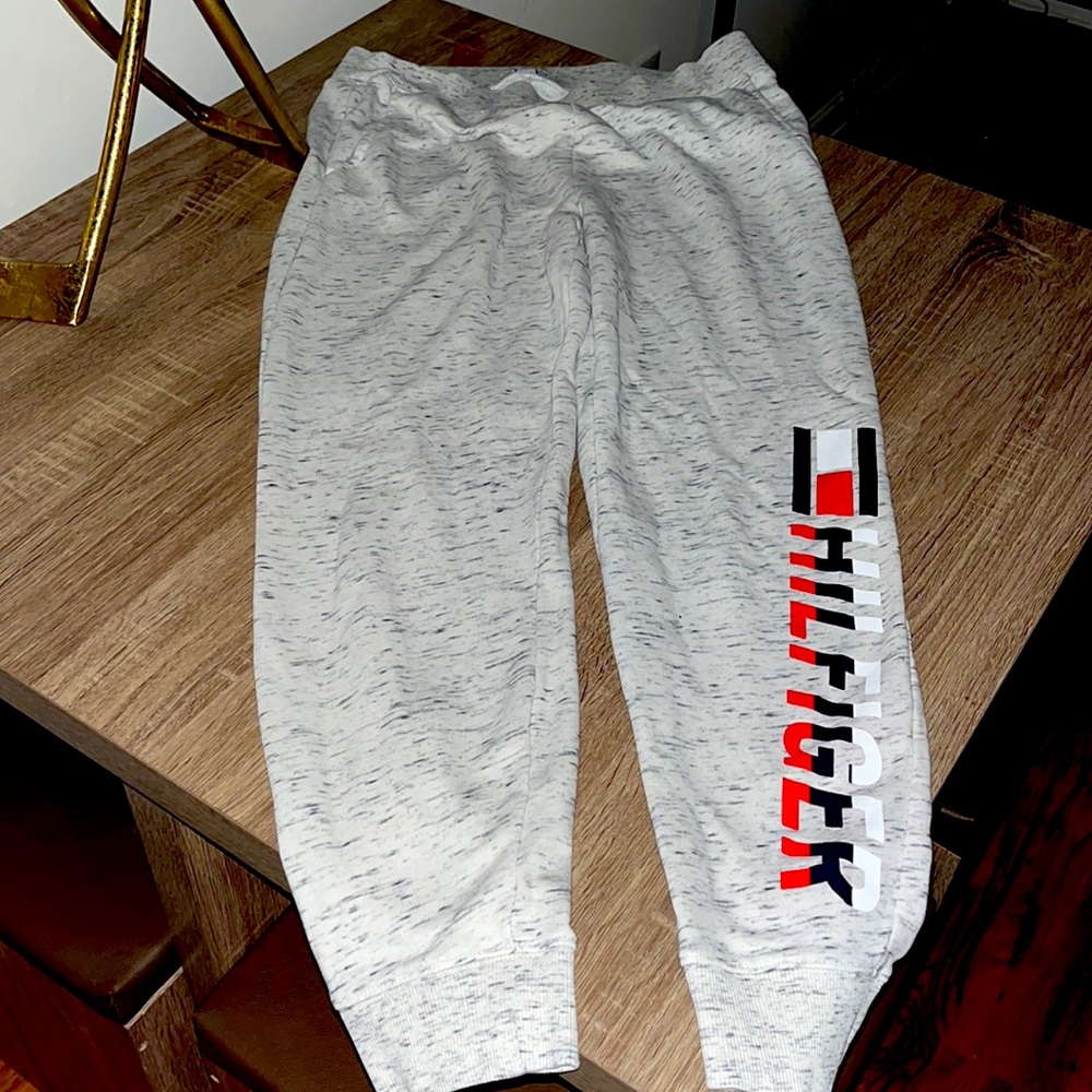 Gently worn light grey, red, and blue Tommy Hilfiger joggers outfit.
